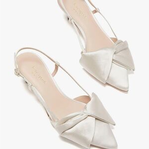 Kate Spade Cream Heels with Sophisticated Design